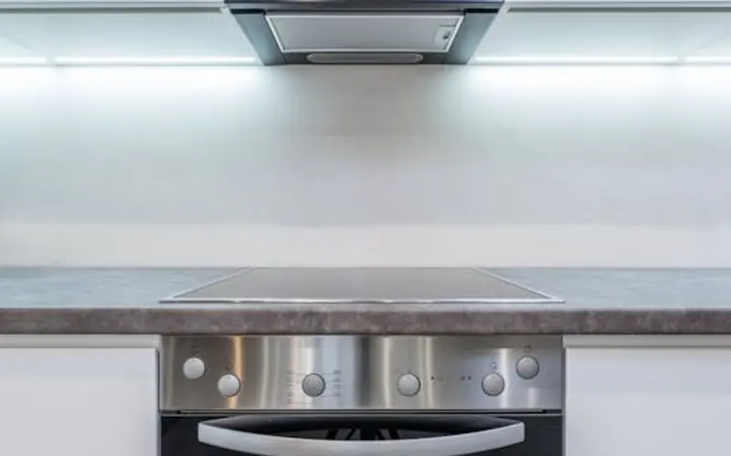 Oven and kitchen deep cleaning — gleaming appliance after professional clean